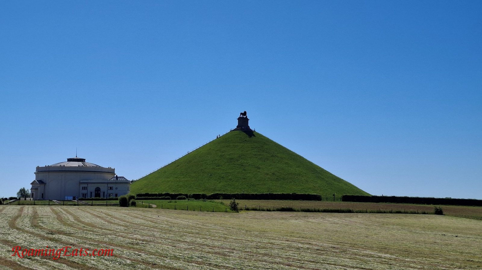 The Lion's Mound rising from flat farmland at Waterloo