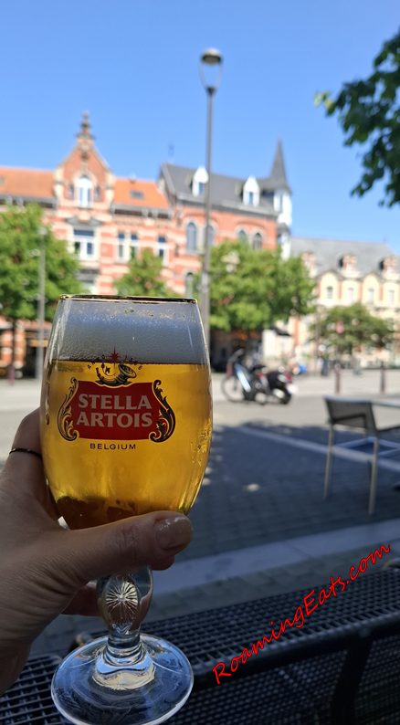 A cold glass of Stella Artois on an outdoor terrace in Leuven