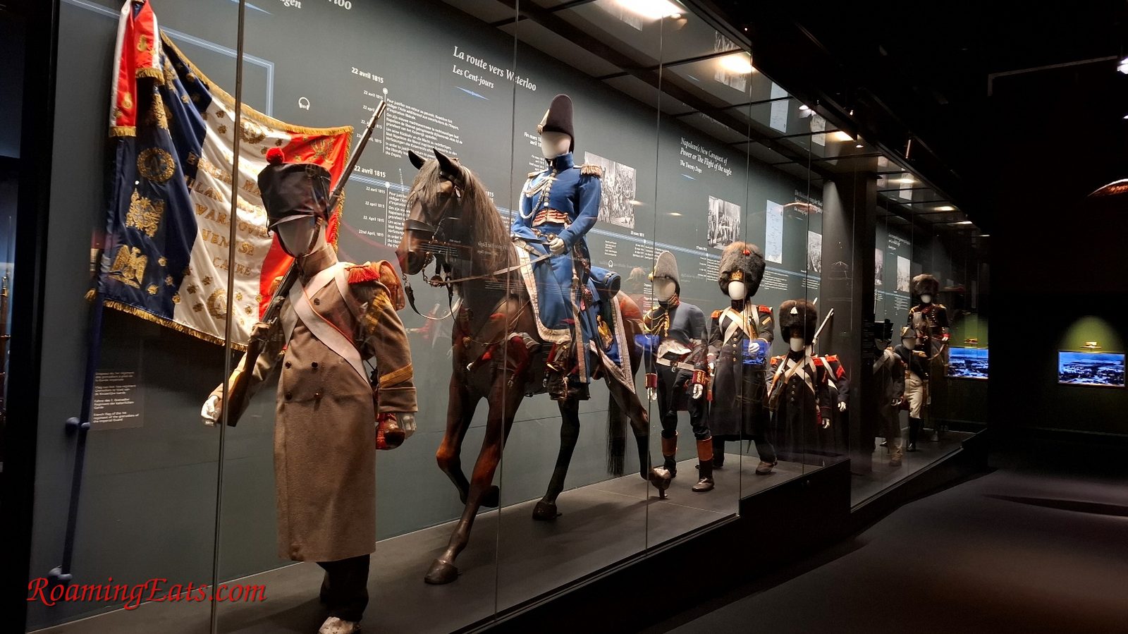 Period uniforms and mannequins on display in the museum